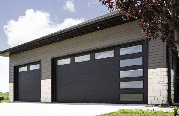 Contemporary black aluminum garage doors with frosted glass insets